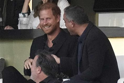 prince harry watches messi.